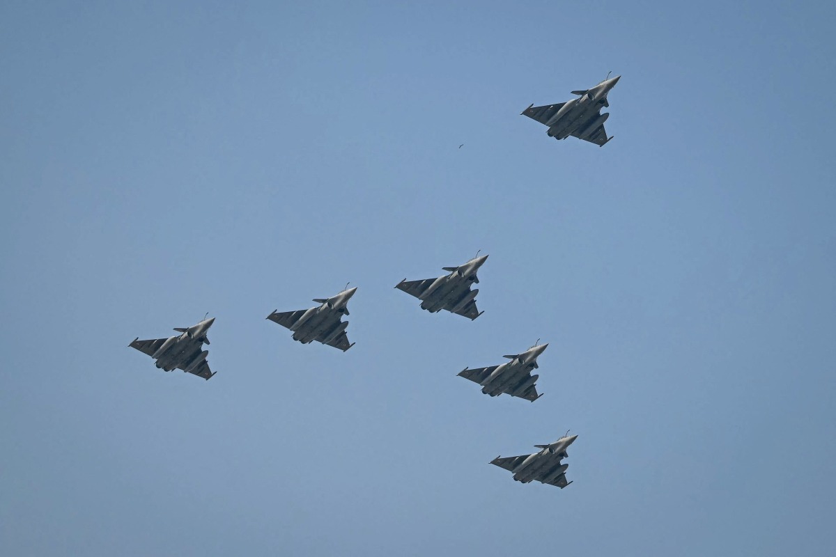 Indian Air Force's Rafale jets fly during the country's 77th Republic Day parade at Kartavya Path in New Delhi on January 26, 2026. (Photo by Sajjad HUSSAIN / AFP)
