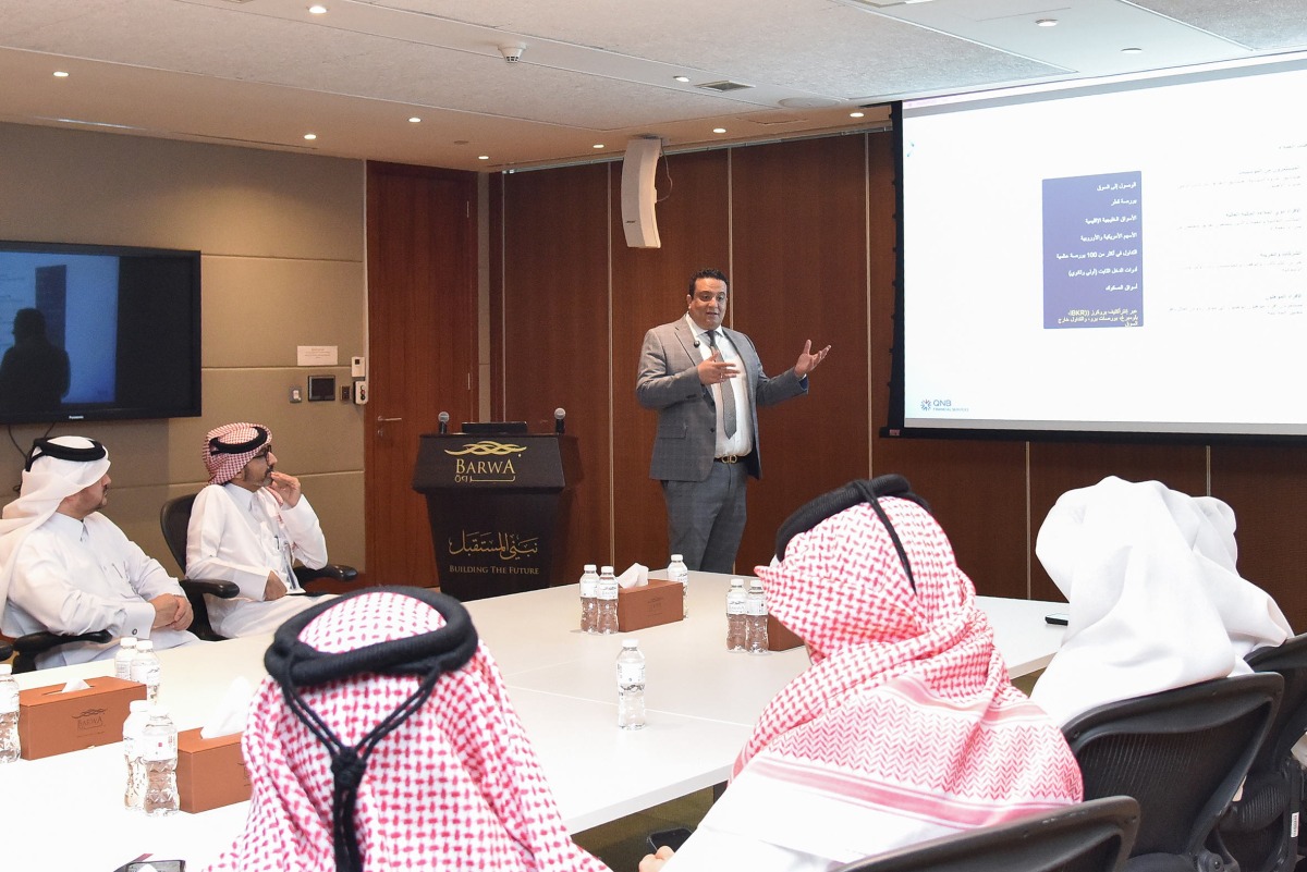Participants attend an investment awareness workshop.