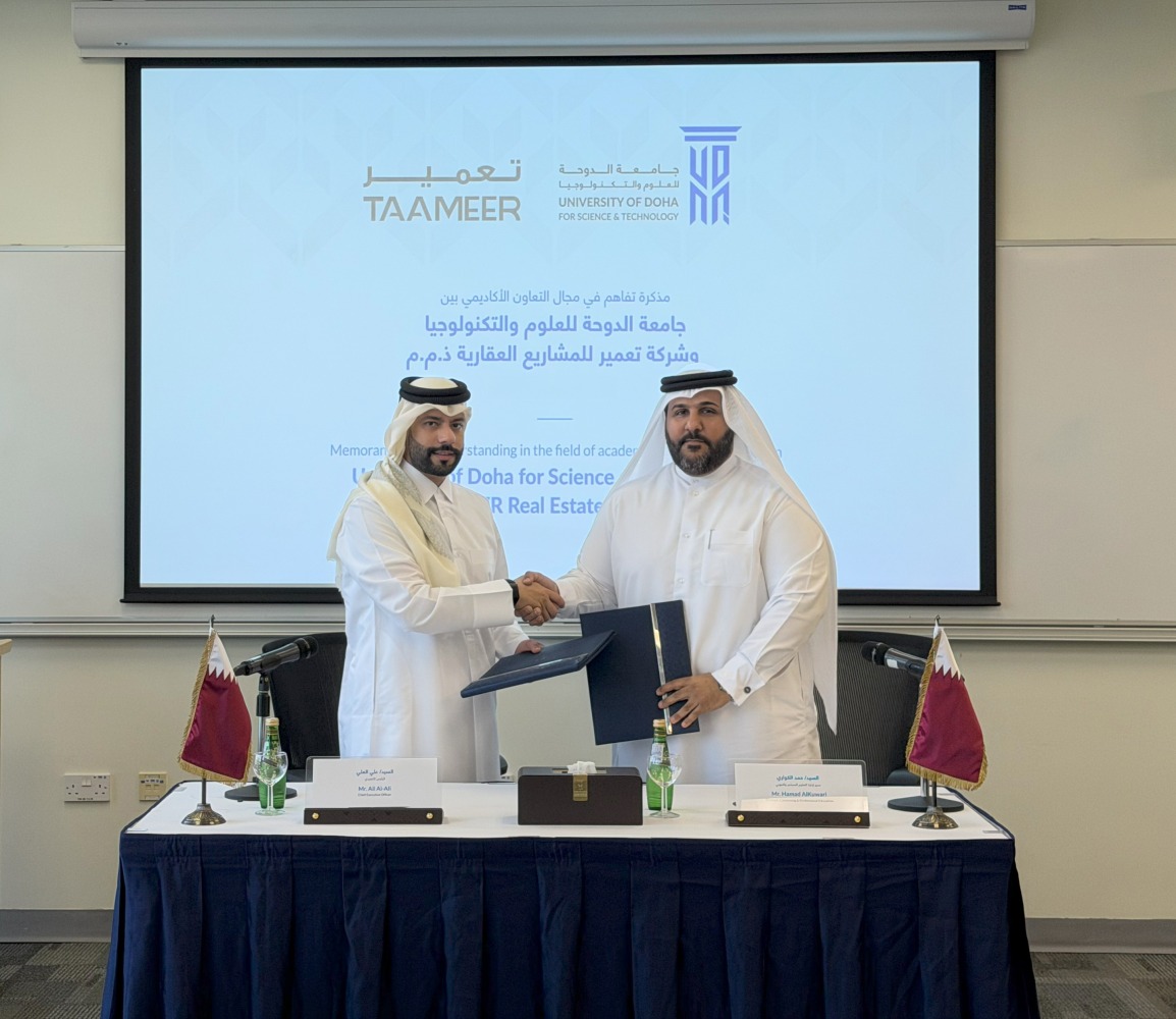 Officials from the two entities at the MoU signing ceremony.