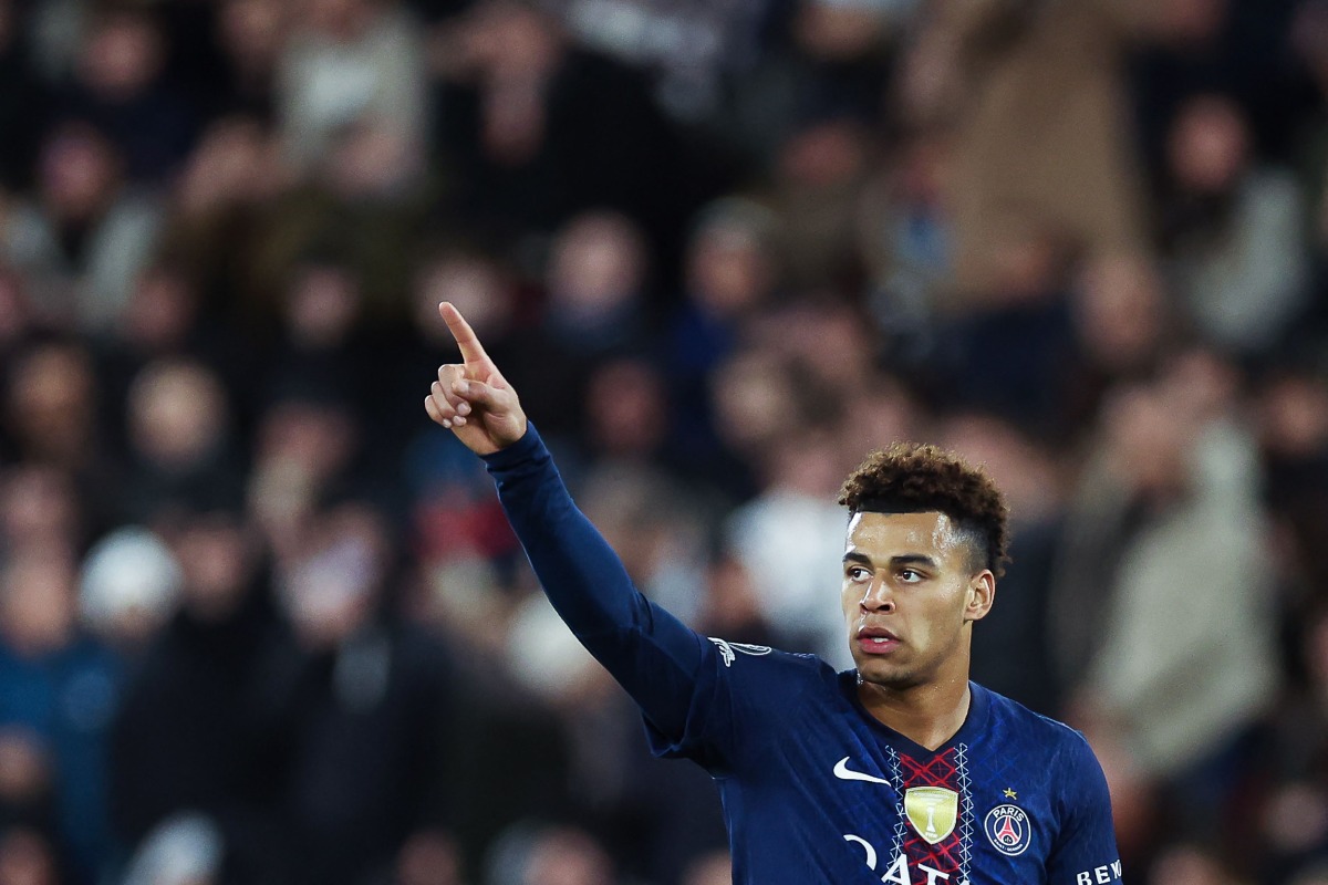 Paris Saint-Germain's French midfielder #14 Desire Doue celebrates scoring his team's third goal during the UEFA Champions League knockout round play-off first leg football match between AS Monaco and Paris Saint-Germain at the Stade Louis II in the Principality of Monaco on February 17, 2026. (Photo by Valery HACHE / AFP)