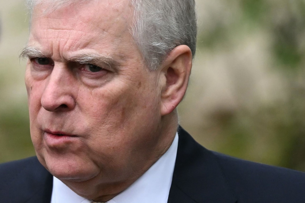 Britain's Prince Andrew, Duke of York reacts as he leaves St. George's Chapel, in Windsor Castle, after attending the Easter Mattins Service, on March 31, 2024.  (Photo by Justin Tallis / AFP)