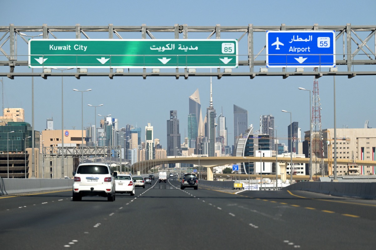 Vehicles drive along the highway leading to and from Kuwait City on March 2, 2026. Photo by YASSER AL-ZAYYAT / AFP
