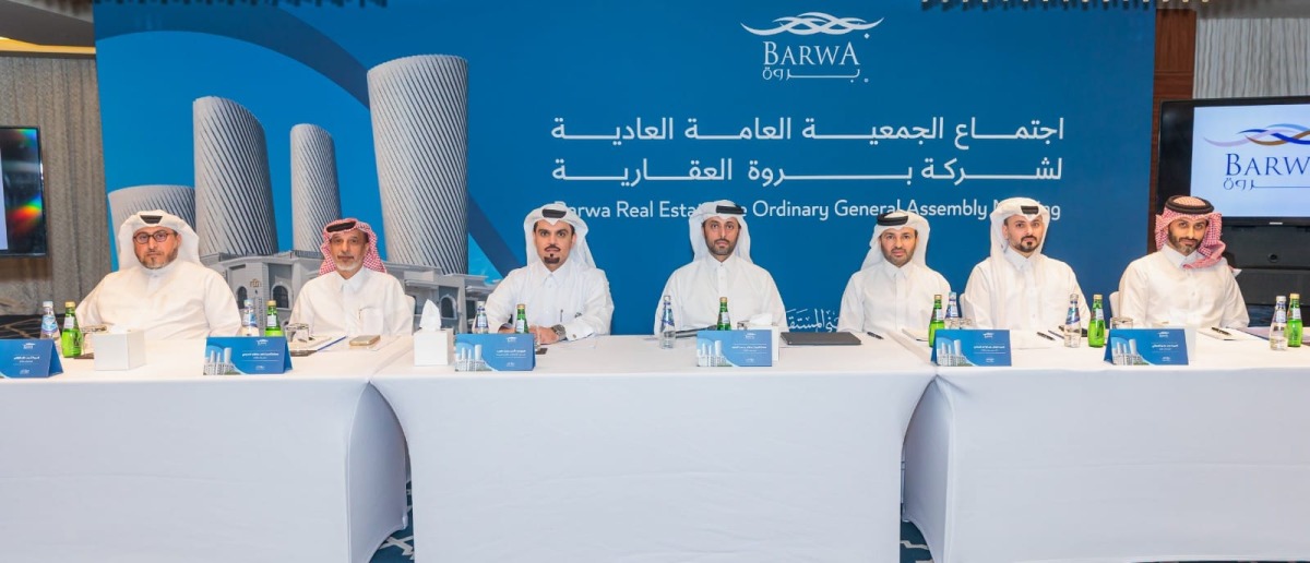 Chairman of the Board H E Abdullah bin Hamad bin Abdullah Al Attiyah with other officials during the Ordinary General Assembly meeting.