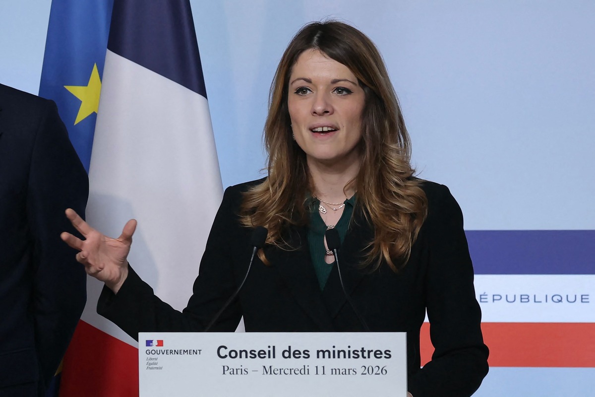 France's Government Spokesperson Maud Bregeon gestures as she addresses media during a press conference following the weekly cabinet meeting in Paris on March 11, 2026. (Photo by Thomas SAMSON / AFP)
