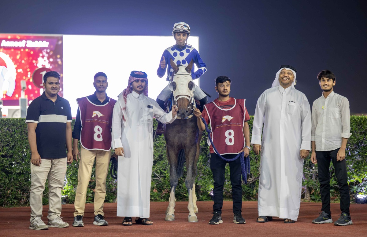 The connections of Aaneef Zakhir celebrate their win. PIC: Juhaim/QREC