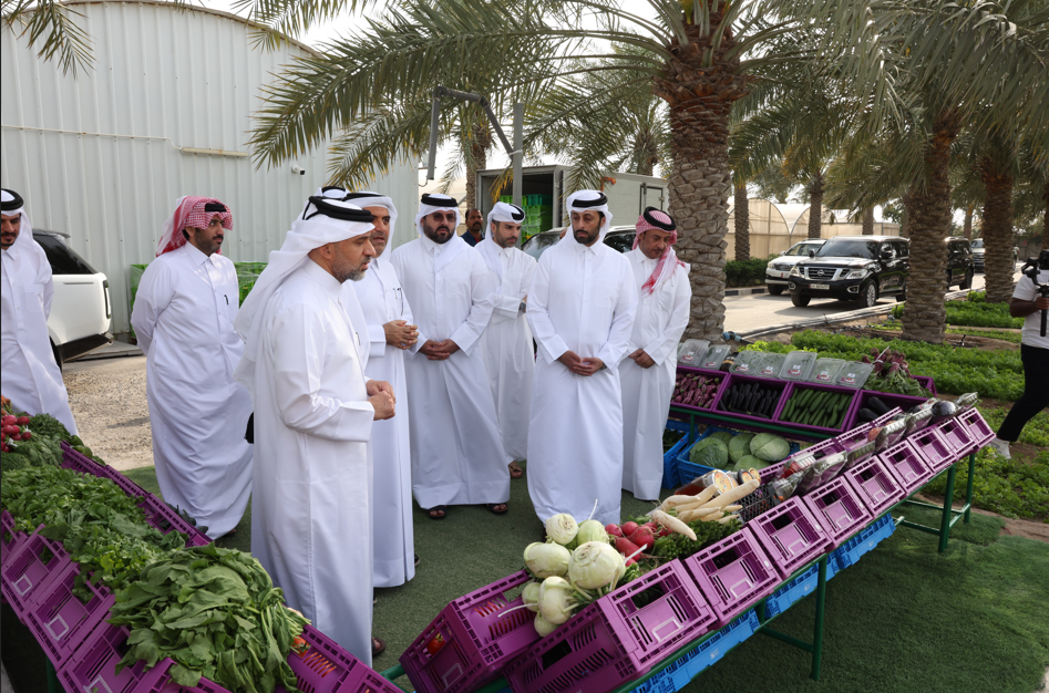 Minister of Municipality H E Abdullah bin Hamad bin Abdullah Al Attiyah with other officials during their visit to a local farm.
