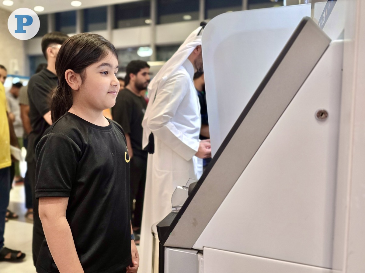 File photo of a child at Eidiya ATM 