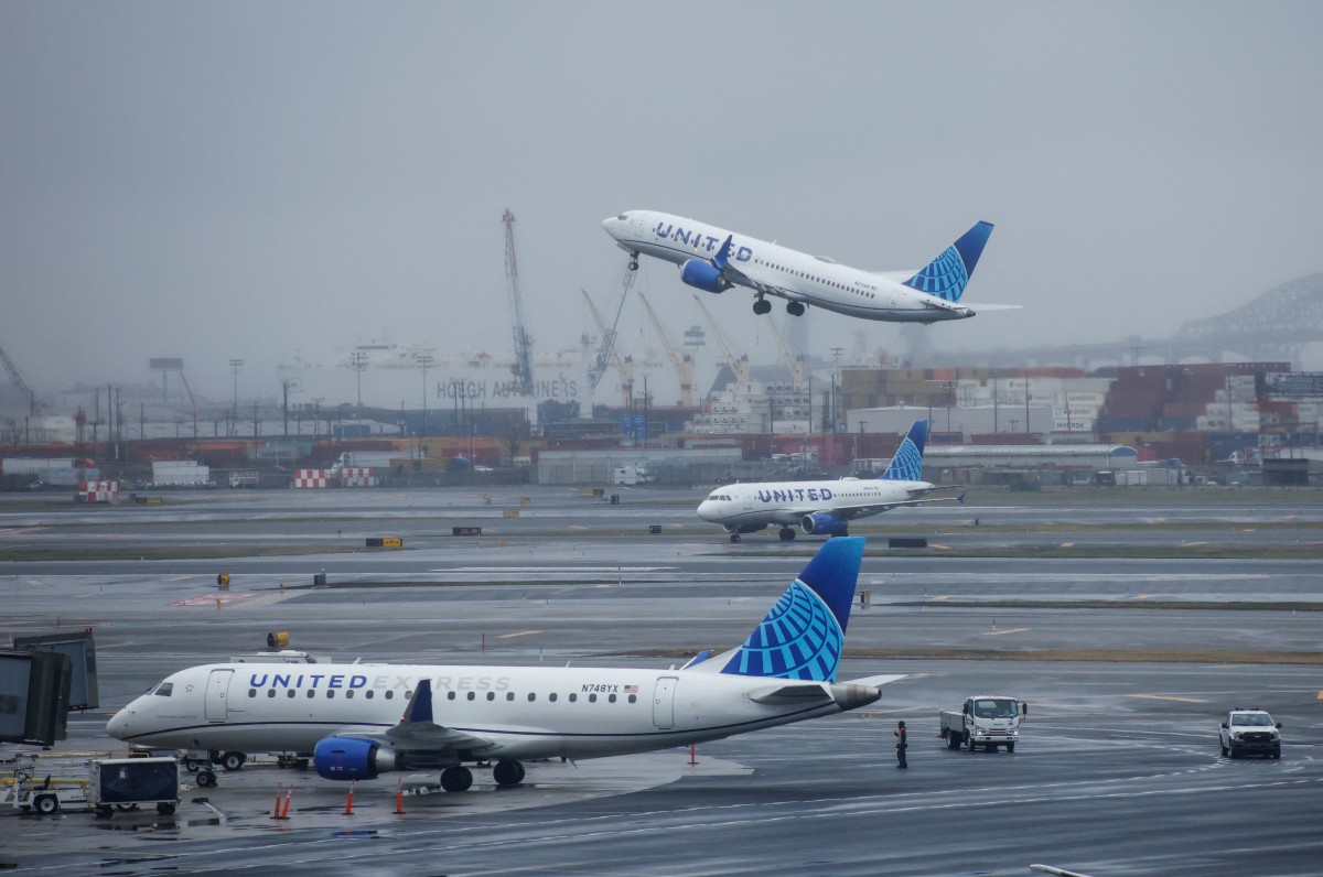 A United Airlines passenger plane takes off at Newark International Airport in Newark, New Jersey, on March 23, 2026. Photo by KENA BETANCUR / AFP

