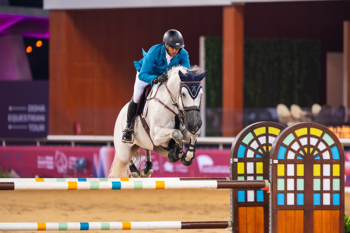 Qatari rider Bassem Mohammed guides Wathnan Zodiak over a fence during the CSI5* 145cm event.