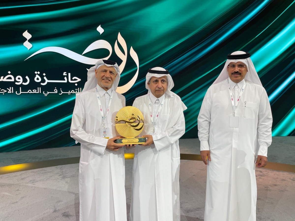 QCS officials with the award.