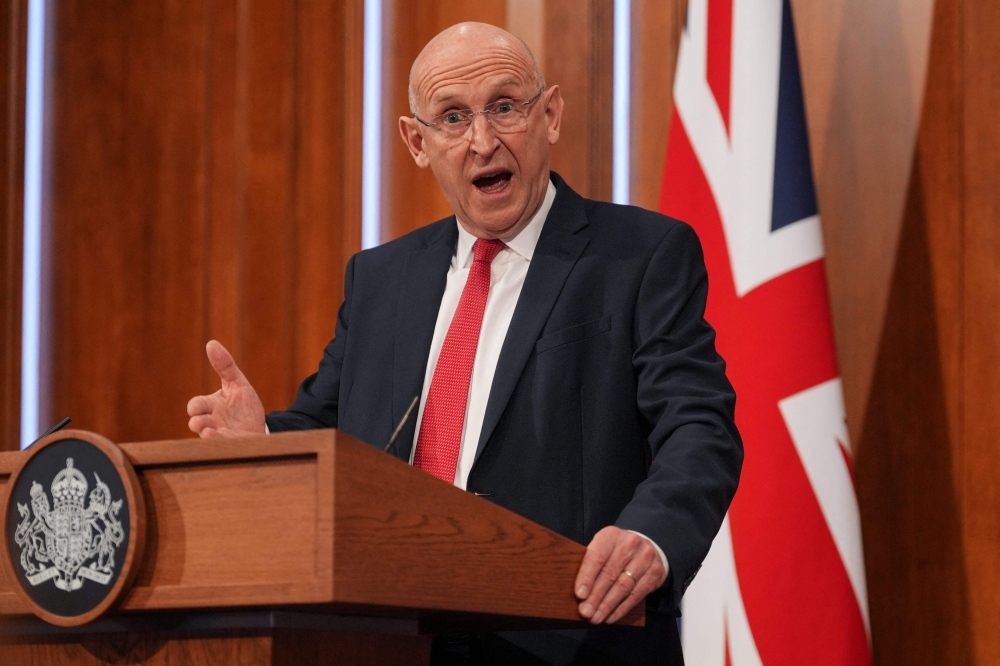 Britain's Defence Secretary John Healey delivers a statement on recent UK operational activity at 9 Downing Street in central London on April 9, 2026.  (Photo by Yui Mok / POOL / AFP)