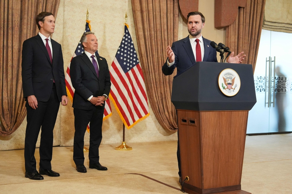 US Vice President JD Vance (R) speaks during a news conference after meeting with representatives from Pakistan and Iran, as Jared Kushner (L) and US Special Envoy to the Middle East Steve Witkoff (C) watch, in Islamabad on April 12, 2026. (Photo by Jacquelyn Martin / POOL / AFP)