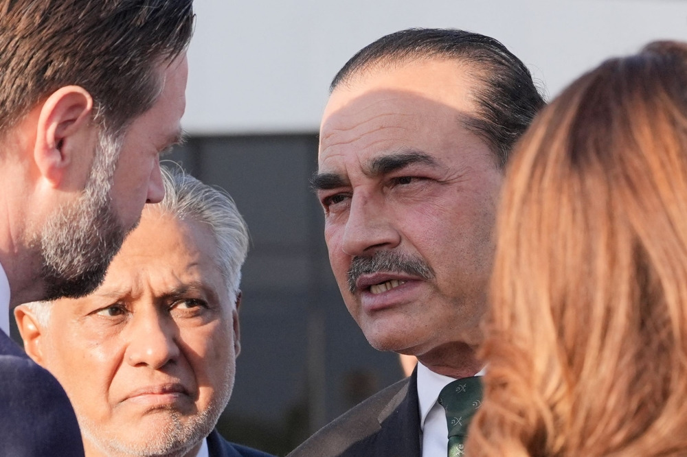 US Vice President JD Vance (L) talks to Pakistan's Chief of Defence Forces and Chief of Army Staff Field Marshall Asim Munir (R) and Pakistan's Deputy Prime Minister and Foreign Minister Mohammad Ishaq Dar (C) before boarding Air Force Two after attending talks on Iran in Islamabad on April 12, 2026. Iran and the United States failed to reach an agreement to end the war in the Middle East, US Vice President JD Vance said April 12 after marathon talks in Islamabad, adding that he was leaving negotiations after giving Tehran the 