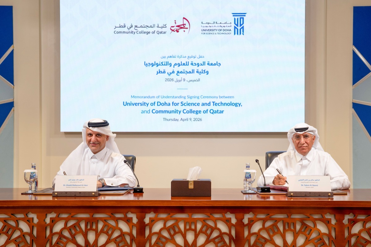 President of UDST Dr. Salem Al-Naemi and President of the Community College of Qatar Dr. Khalid Mohammed Al-Horr signing the agreement. 