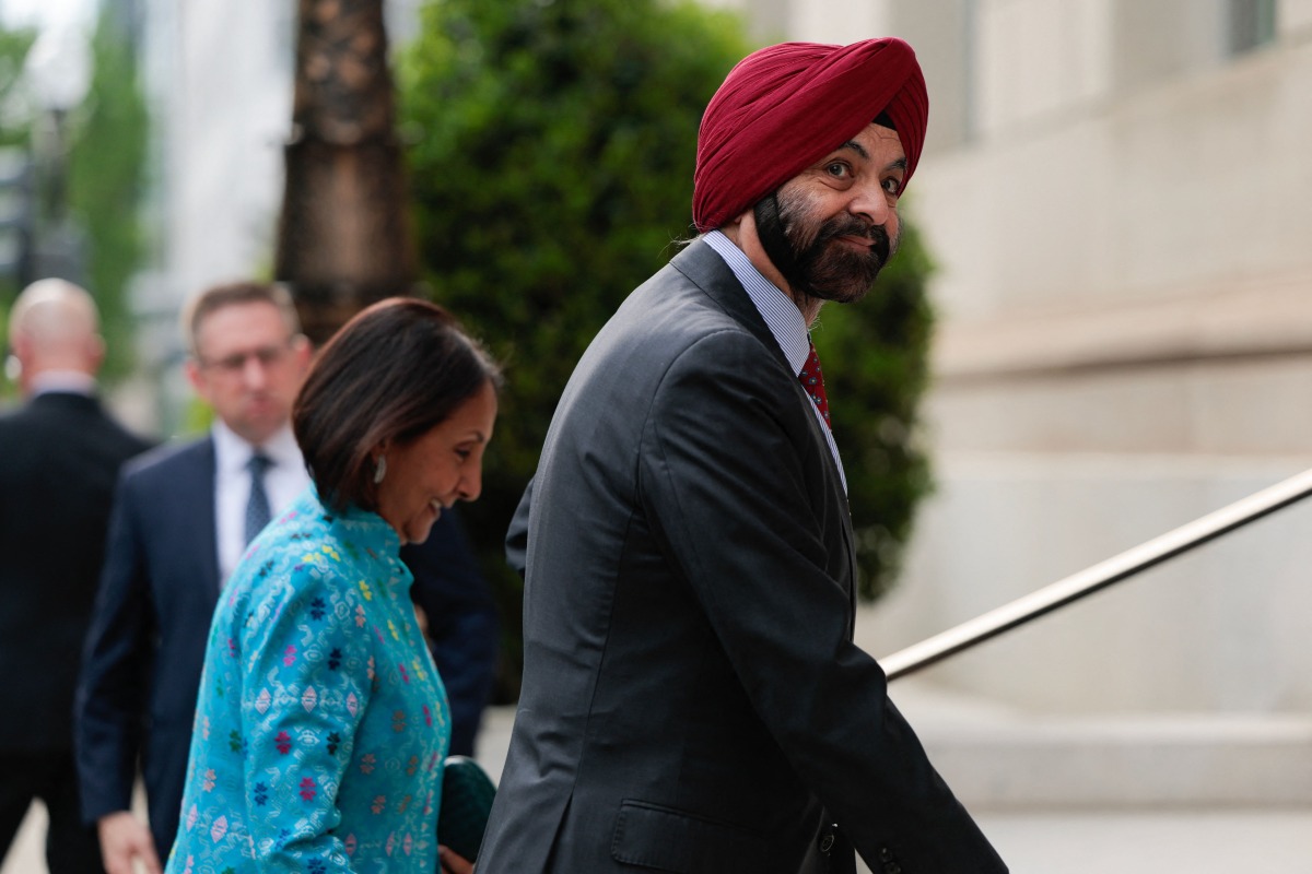 World Bank Group President Ajay Banga and his wife Ritu Banga arrive for an event in honor of Dutch King Willem-Alexander (L) and Queen Maxima at the US Chamber of Commerce in Washington, DC, on April 13, 2026. (Photo by Kent Nishimura / AFP)