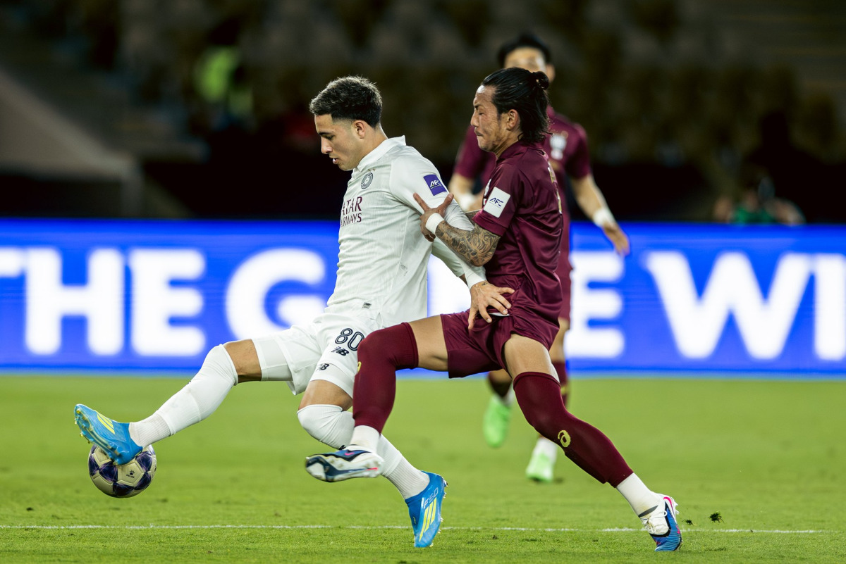 Al Sadd’s Agustín Soria (left) vies for the ball with a Vissel Kobe player during the quarter-final tie.