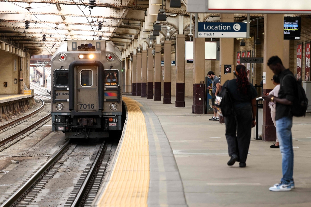 An NJ Transit train bound for New York pulls into Newark Penn Station in Newark, New Jersey on April 17, 2026. (Photo by Charly Triballeau / AFP)