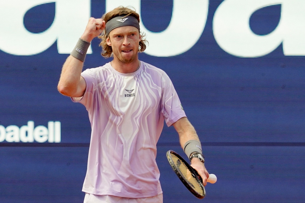 Russia's Andrey Rublev reacts after winning his men's singles semif-final match against Serbia's Hamad Medjedovic at the ATP Barcelona Open 