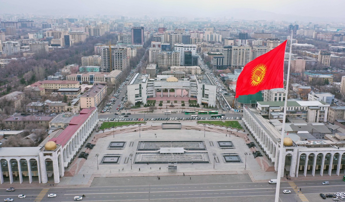 An aerial view shows the Kyrgyz capital of Bishkek on March 23, 2026. (Photo by Vyacheslav OSELEDKO / AFP)
