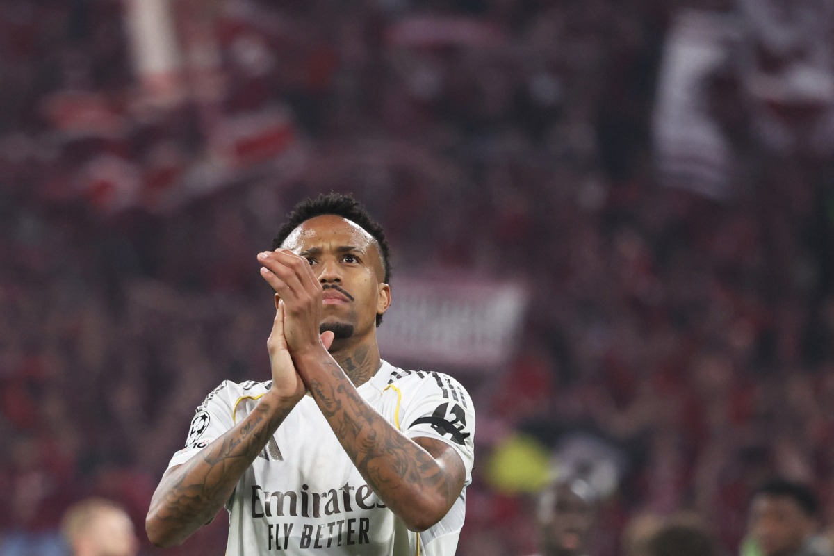 Real Madrid's Brazilian defender #03 Eder Militao greets the fans after the end of the UEFA Champions League quarter-final second leg football match between FC Bayern Munich and Real Madrid in Munich, southern Germany, on April 15, 2026. (Photo by Karl-Josef HILDENBRAND / AFP)