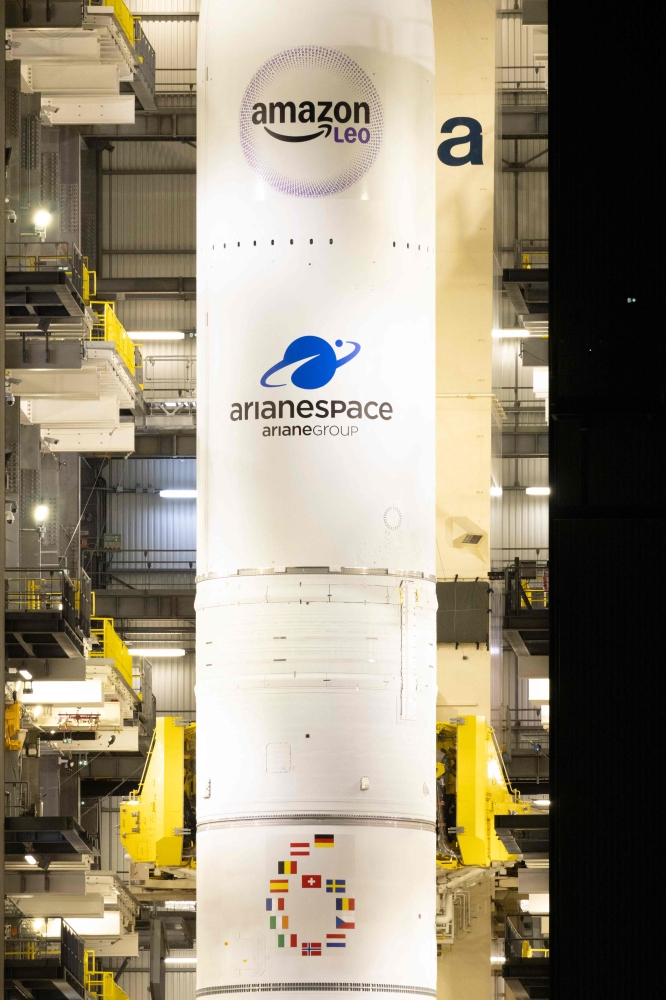 This photograph shows a view of the Arianespace's Ariane 6 rocket carrying the Amazon Leo LE-02 payload ahead of its launching as part of Flight VA268, at the Guiana Space Centre in Kourou, on the French overseas department of Guiana on April 30, 2026. (Photo by RONAN LIETAR / AFP)
