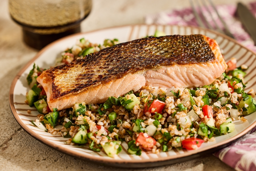 Crispy Salmon and Bulgur Salad. Picture: Tom McCorkle/For The Washington Post; food styling by Gina Nistico