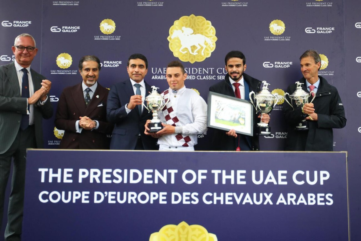 The connections of Lacaro Du Croate receive their awards after the Mansoor Khalil M. Al-Shahwani-owned mare won the President of the UAE Cup at ParisLongchamp yesterday.