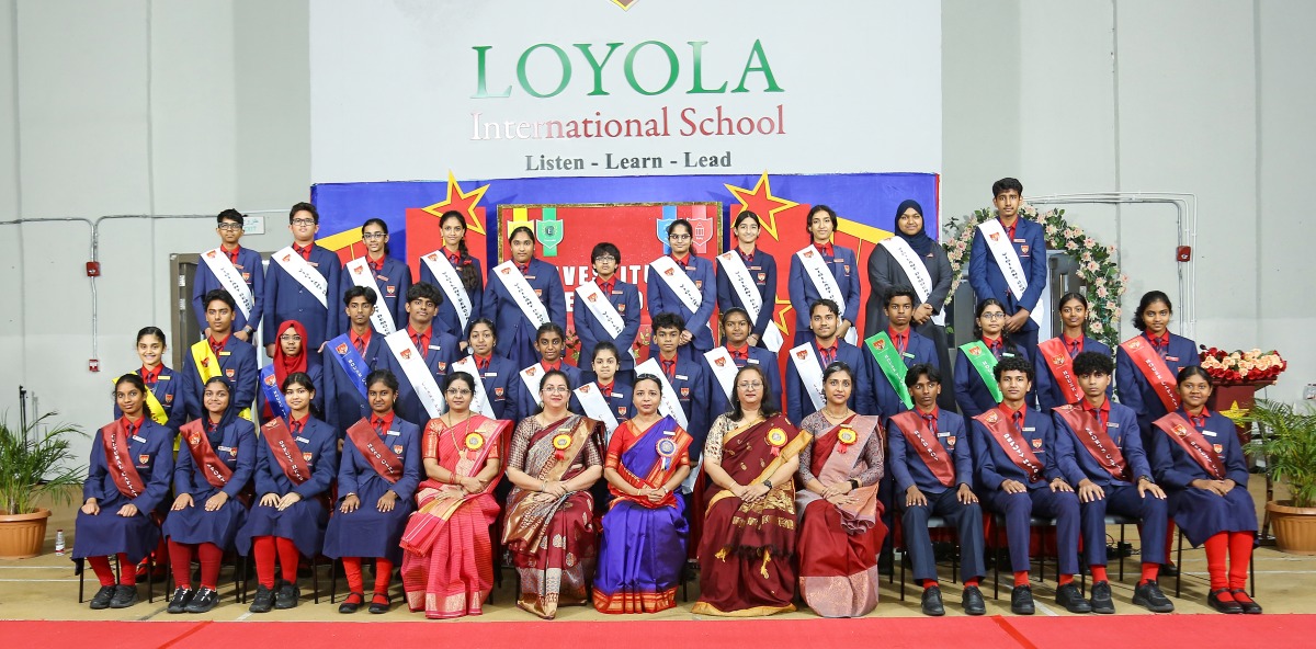Principal Bhavna Vijaykumar S with teachers and newly elected members of the Student Council.