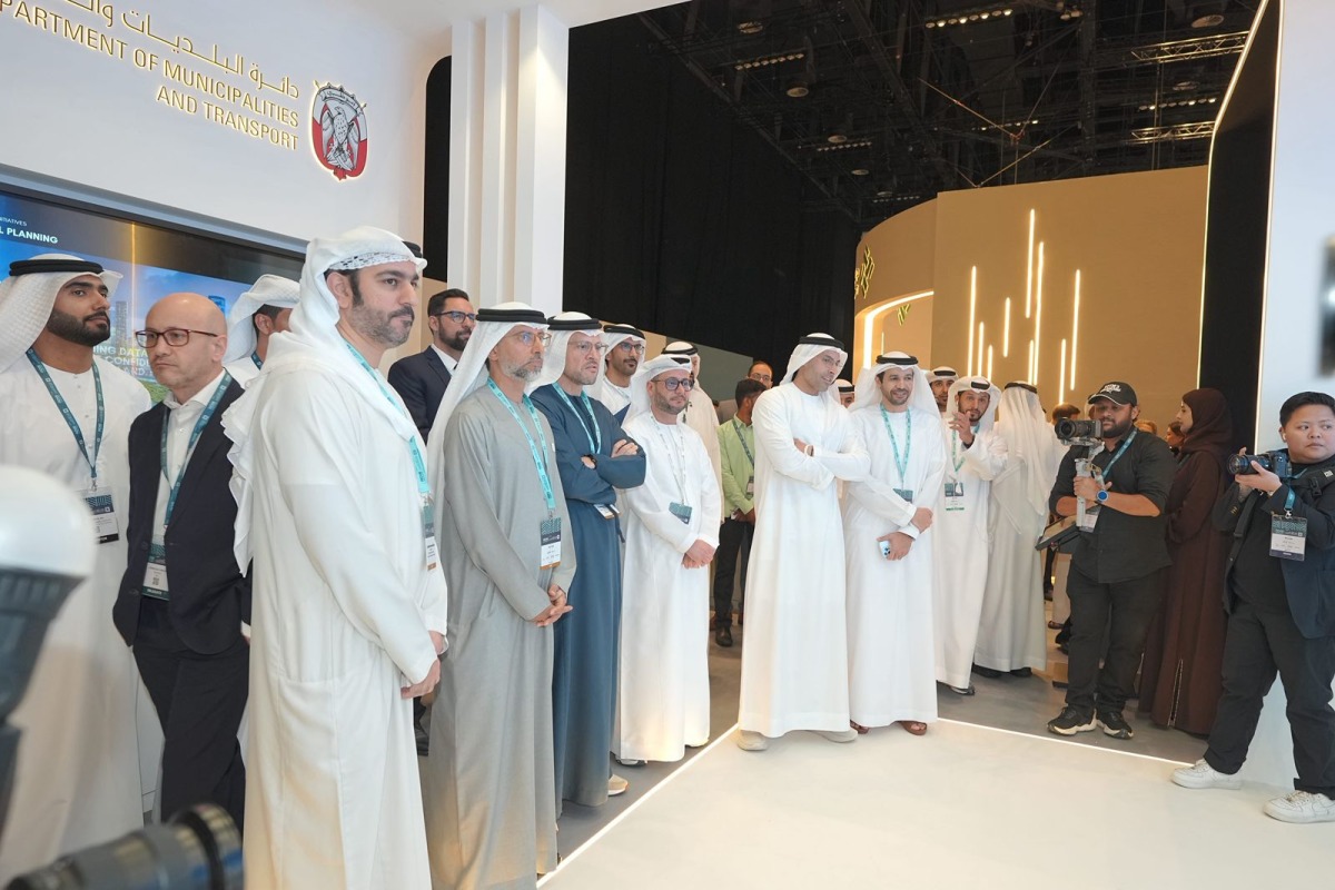Officials touring exhibitors on the opening day of the summit yesterday. 