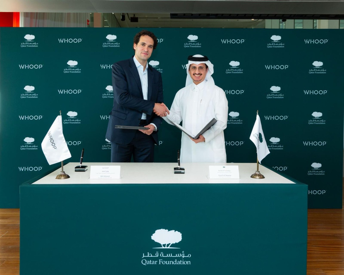CEO of Qatar Foundation Yousif Al-Naama (right) and Founder and CEO of WHOOP Will Ahmed at the signing ceremony. 