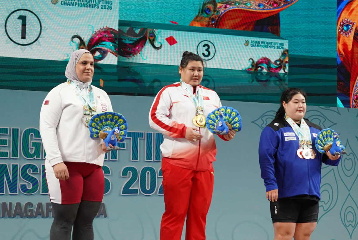 Qatar’s Ouisal Ikhlef (left) delivered an impressive performance at the Asian Weightlifting Championships in Gandhinagar, India,