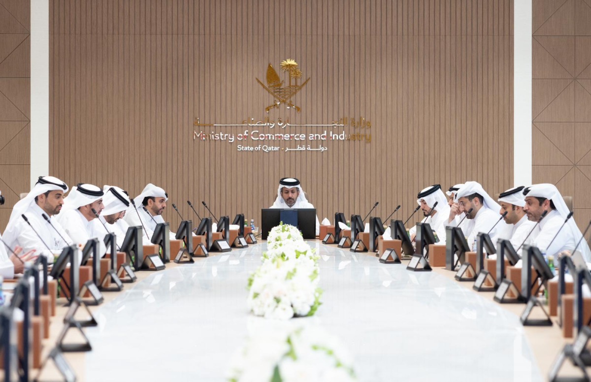 Minister of Commerce and Industry H E Sheikh Faisal bin Thani bin Faisal Al Thani with other officials during the meeting.