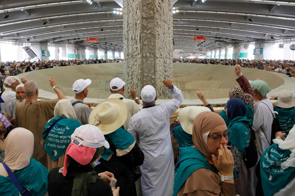 Muslims pilgrims perform the symbolic 