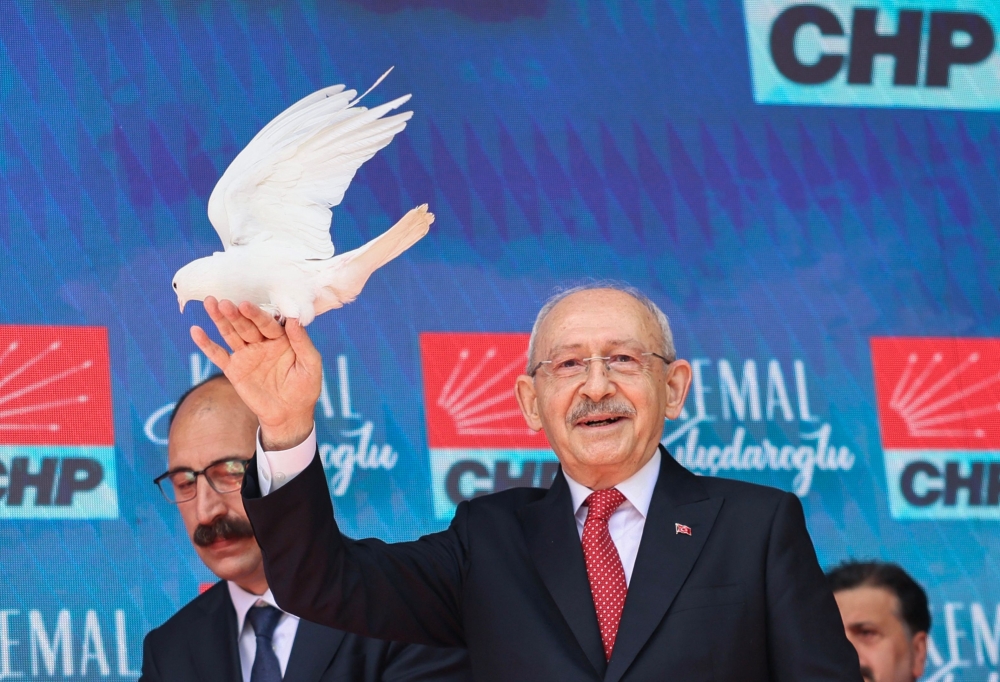 Turkey's main opposition CHP party's court-installed leader, Kemal Kilicdaroglu holds a dove after his speech at the party's headquarters in Ankara on May 30, 2026.(Photo by Adem Altan/ AFP)
