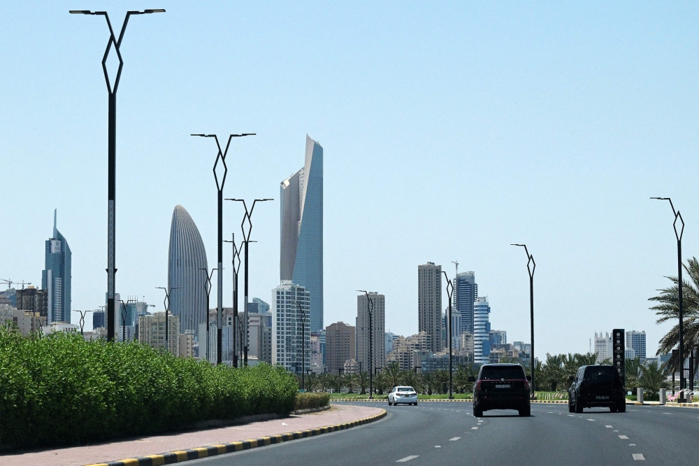 Vehicles move along a main road in Kuwait City on June 2, 2026. (Photo by Yasser al-Zayyat / AFP)
