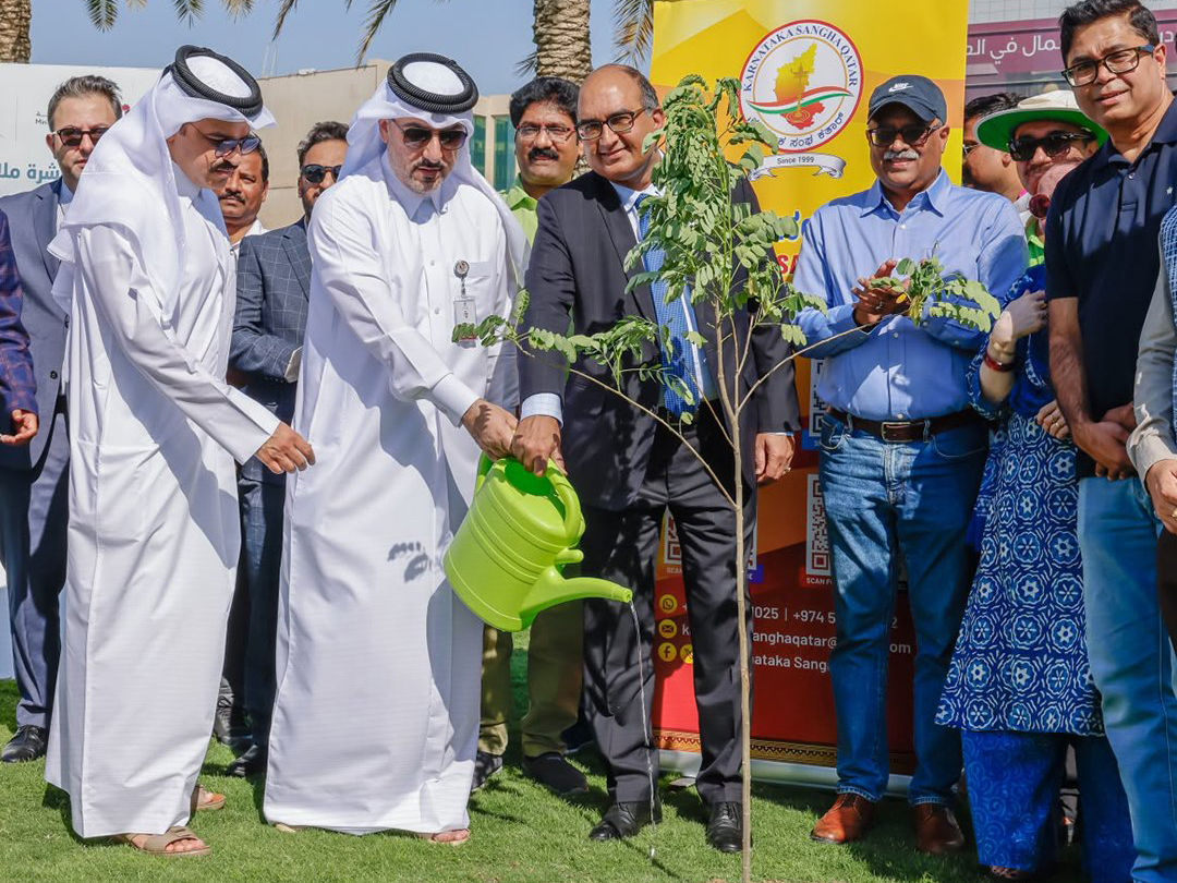 Ambassador of India to Qatar H E Vipul with Assistant Director of the Public Parks Department Mohammed Abdullah Mohammed and other officials planting a sapling during the event.