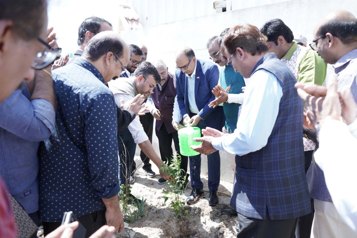Ambassador of India to Qatar H E Vipul with other officials during the event.