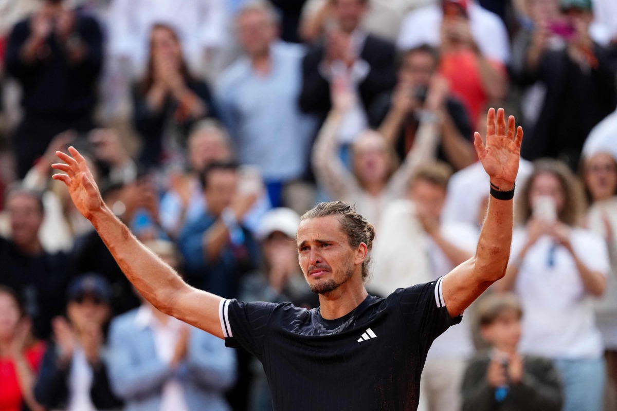 Germany's Alexander Zverev celebrates after winning the mens final singles match against Italy's Flavio Cobolli on day 15 of the French Open tennis tournament on Court Philippe-Chatrier at the Roland-Garros Complex in Paris on June 7, 2026. (Photo by Dimitar DILKOFF / AFP)