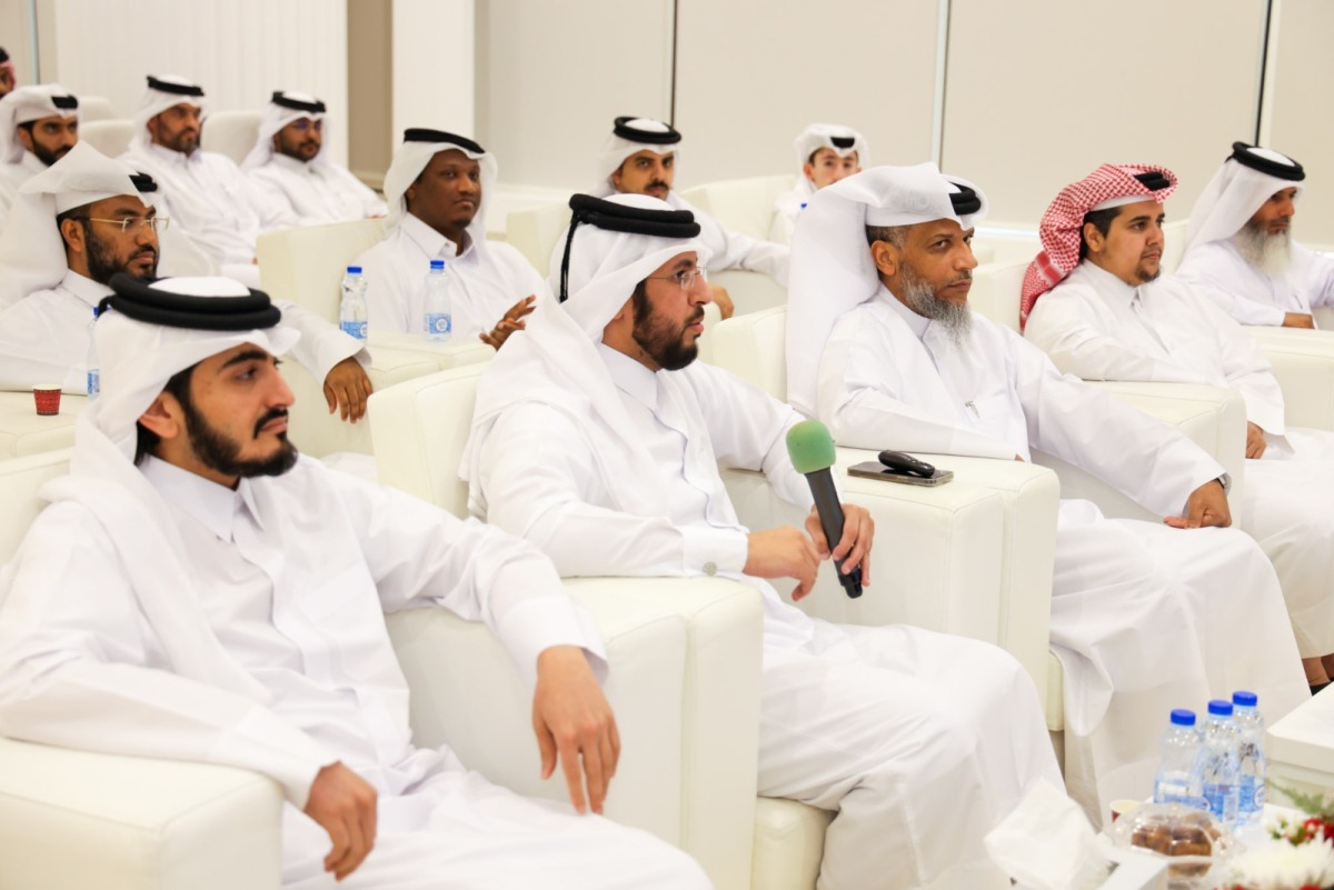 Ministry of Awqaf officials during the launch of the app at a ceremony.