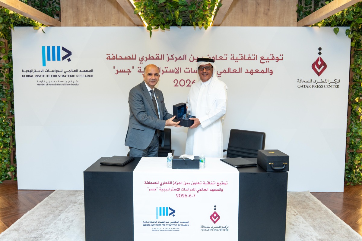 QPC Director General Sadiq Mohammed Al Amari and GISR Executive Director Dr. Mohamed Chihi during the signing ceremony.