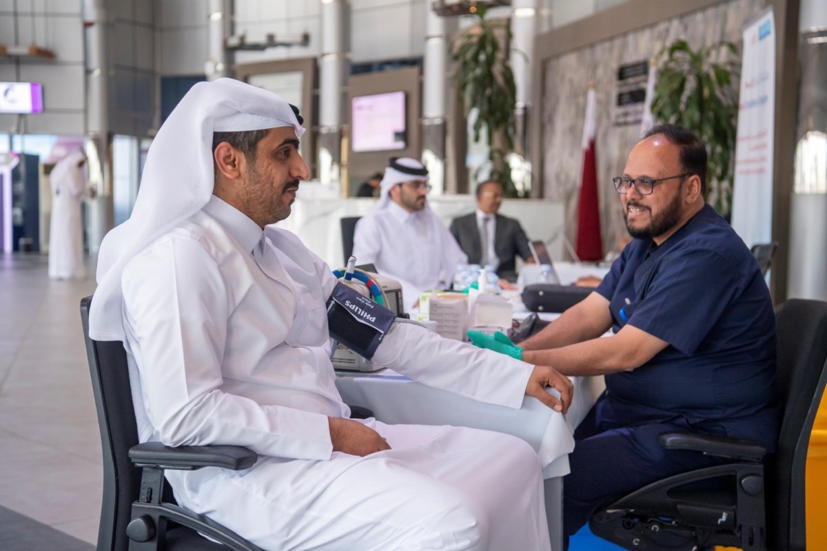 An Ashghal official during the blood donation campaign.