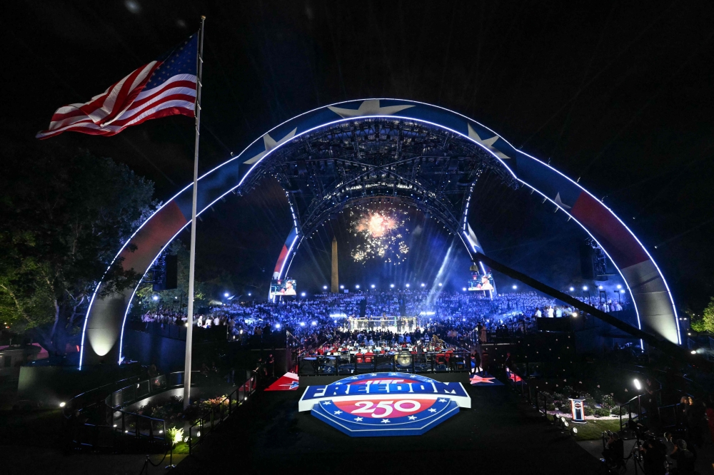 Fireworks go off ahead of the final bout between Georgia's Ilia Topuria and America's Justin Gaethje during the 