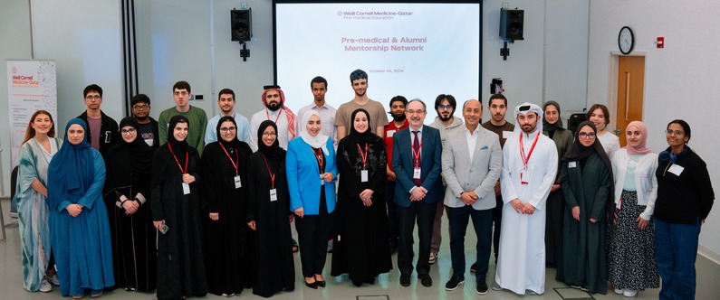 Dr. Marco Ameduri and Dr. Rachid Bendriss with WCM-Q staff, alumni, and students.