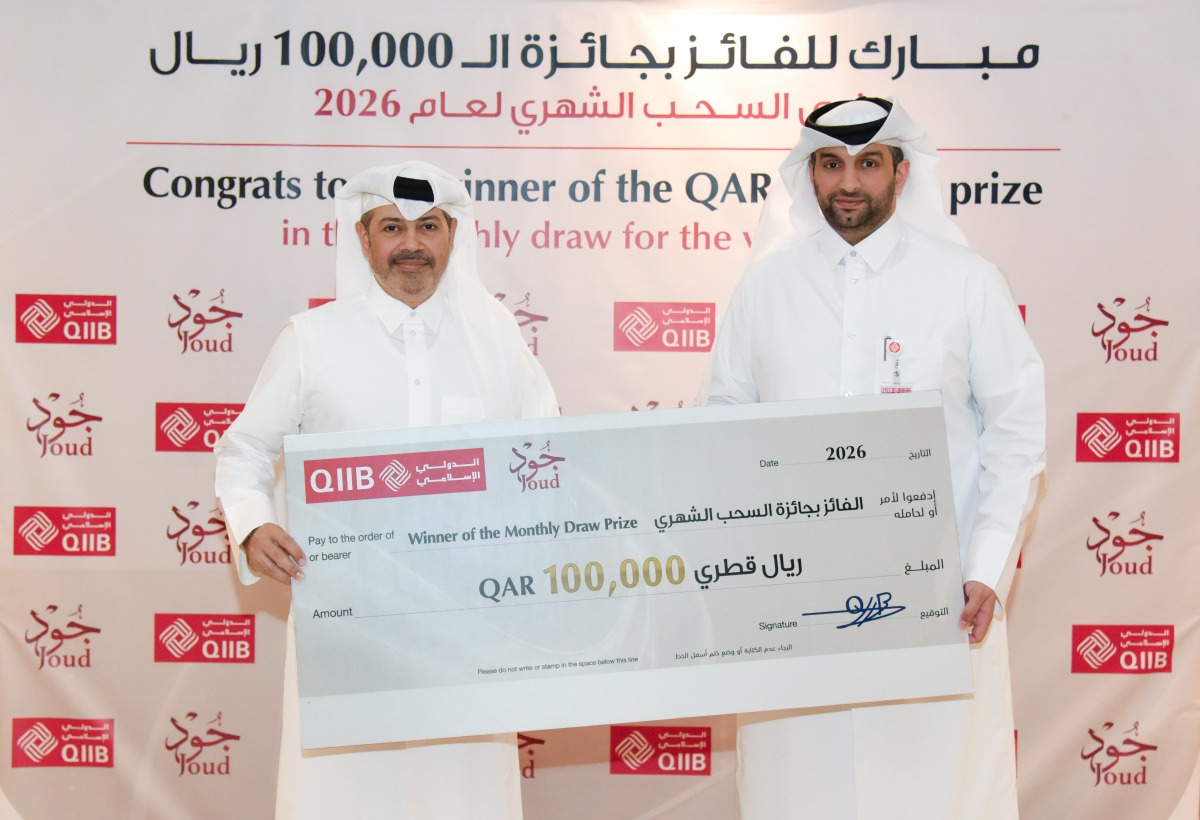 QIIB’s Head of Products Talal al-Jaidah presenting a cheque to the winner Ali Hussain H AL Baker.