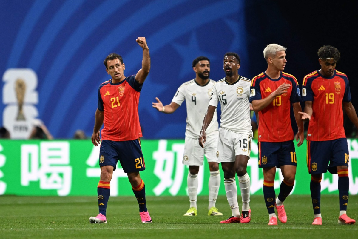 Spain's forward #21 Mikel Oyarzabal (L) celebrates after scoring his team's second goal during the 2026 World Cup Group H football match between Spain and Saudi Arabia at the Atlanta Stadium in Atlanta on June 21, 2026. (Photo by ROBERTO SCHMIDT / AFP)