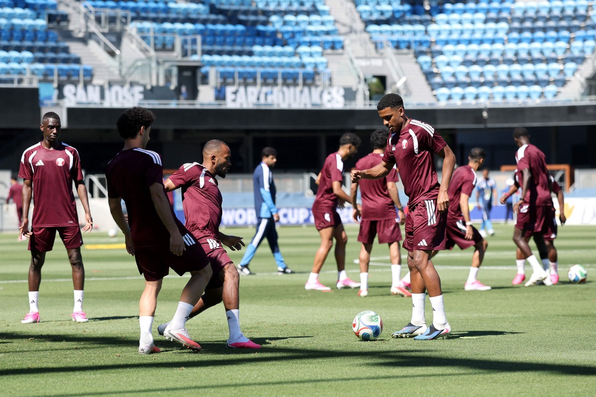 Qatar players participate in a training session.