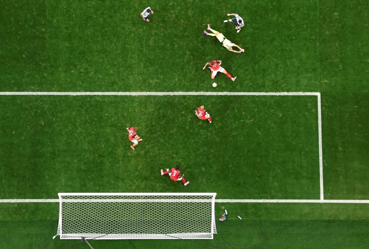 Lionel Messi #10 of Argentina shoots while Marco Friedl #23 of Austria blocks during the FIFA World Cup 2026 Group J match between Argentina and Austria at Dallas Stadium on June 22, 2026 in Arlington, Texas. (Photo by Stacy Revere / GETTY IMAGES NORTH AMERICA / Getty Images via AFP)