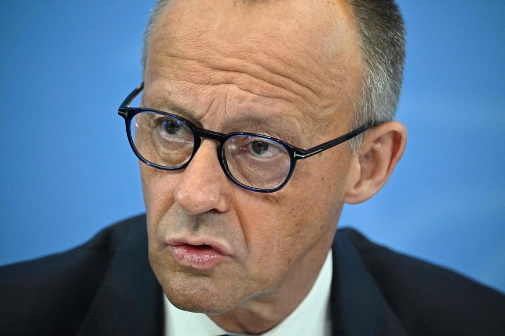 German Chancellor Friedrich Merz speaks during a press conference to present the recommendations of a 13-member pension reform commission at the Chancellery in Berlin on June 23, 2026. (Photo by Tobias Schwarz / AFP)
