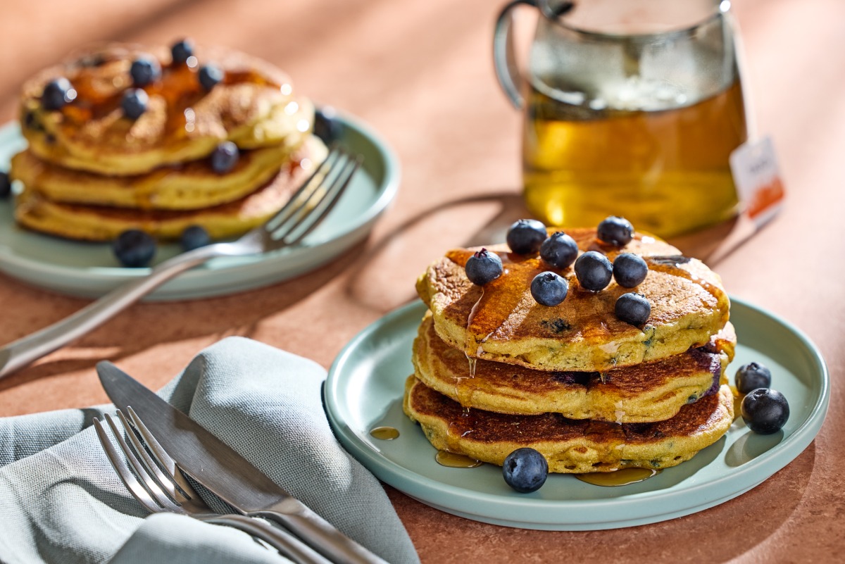 Blueberry Cornmeal Pancakes. (Tom McCorkle/For The Washington Post; food styling by Gina Nistico)