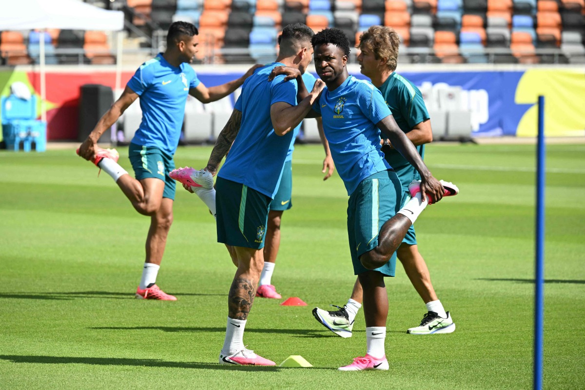 Brazil’s Vinicius Junior (second right) takes part in a training session with teammates.